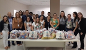 Equipes do Hospital Municipal de Mogi fazem doação para o programa Tampinha Solidária